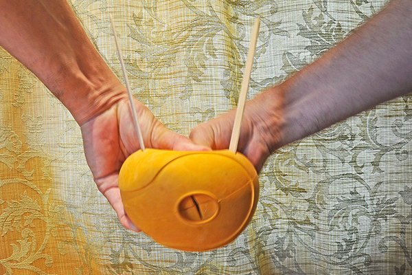 ball squeezed from top to bottom